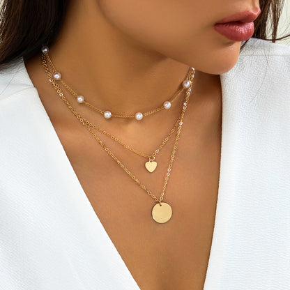 Simple Style Classic Style Irregular Round Imitation Pearl Copper Layered Tassel Layered Necklaces