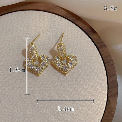 1 Pair Fashion Geometric Heart Shape Bow Knot Plating Inlay Alloy Artificial Pearls Rhinestones 14k Gold Plated Earrings