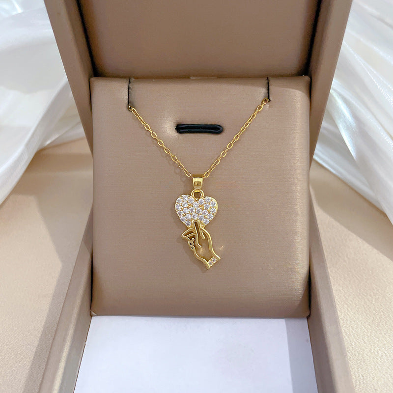 Modern Style Sweet Gesture Heart Shape Titanium Steel Copper Inlay Artificial Gemstones Pendant Necklace