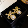 1 Pair Elegant Luxurious Round Bow Knot Plating Inlay Copper Artificial Pearls Rhinestones Ear Studs