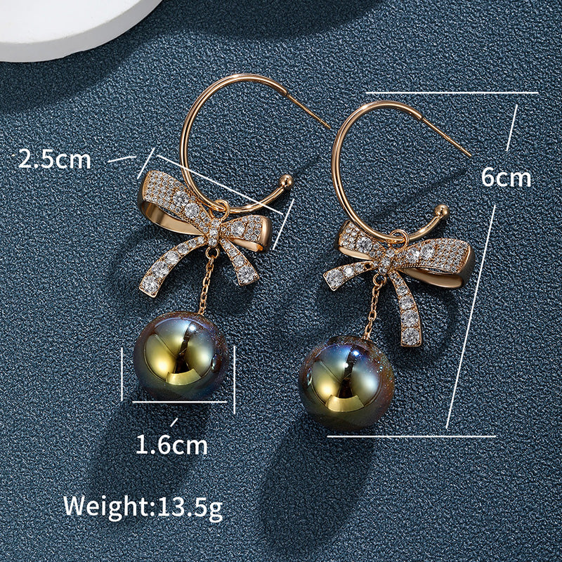 1 Pair Elegant Glam XUPING Bow Knot Inlay Alloy Copper Alloy Artificial Gemstones Artificial Pearls 18K Gold Plated Drop Earrings