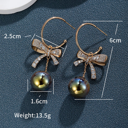 1 Pair Elegant Glam XUPING Bow Knot Inlay Alloy Copper Alloy Artificial Gemstones Artificial Pearls 18K Gold Plated Drop Earrings