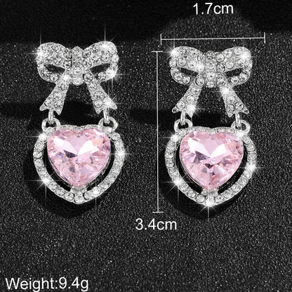 1 Pair Elegant Glam Shiny Heart Shape Bow Knot Plating Inlay Alloy Artificial Pearls Rhinestones Drop Earrings