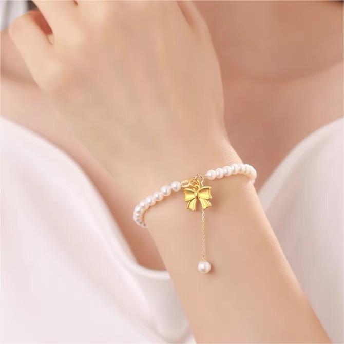 Elegant Sweet Bow Knot Imitation Pearl Copper Beaded Plating Women's Bracelets Necklace