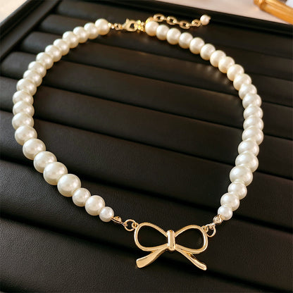 Glam Retro Heart Shape Bow Knot Imitation Pearl Beaded Plating Inlay Rhinestones Women's Layered Necklaces