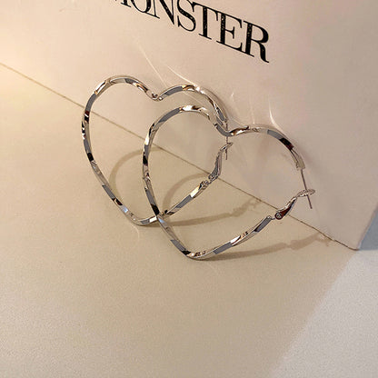 1 Pair Exaggerated Heart Shape Plating Hollow Out Alloy Hoop Earrings