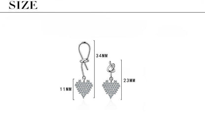1 Pair Simple Style Shiny Heart Shape Knot Asymmetrical Inlay Copper Zircon Drop Earrings