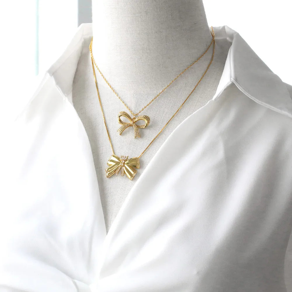 201 Stainless Steel Copper 18K Gold Plated Modern Style Simple Style Plating Inlay Bow Knot Zircon Pendant Necklace