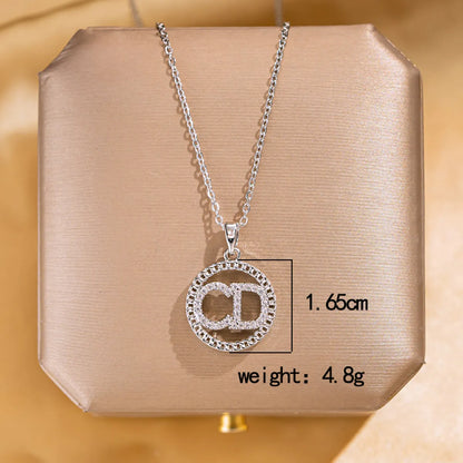 Wholesale Jewelry Elegant Lady Modern Style Letter Butterfly Lock 304 Stainless Steel Copper Acrylic Zircon K Gold Plated Inlay Pendant Necklace