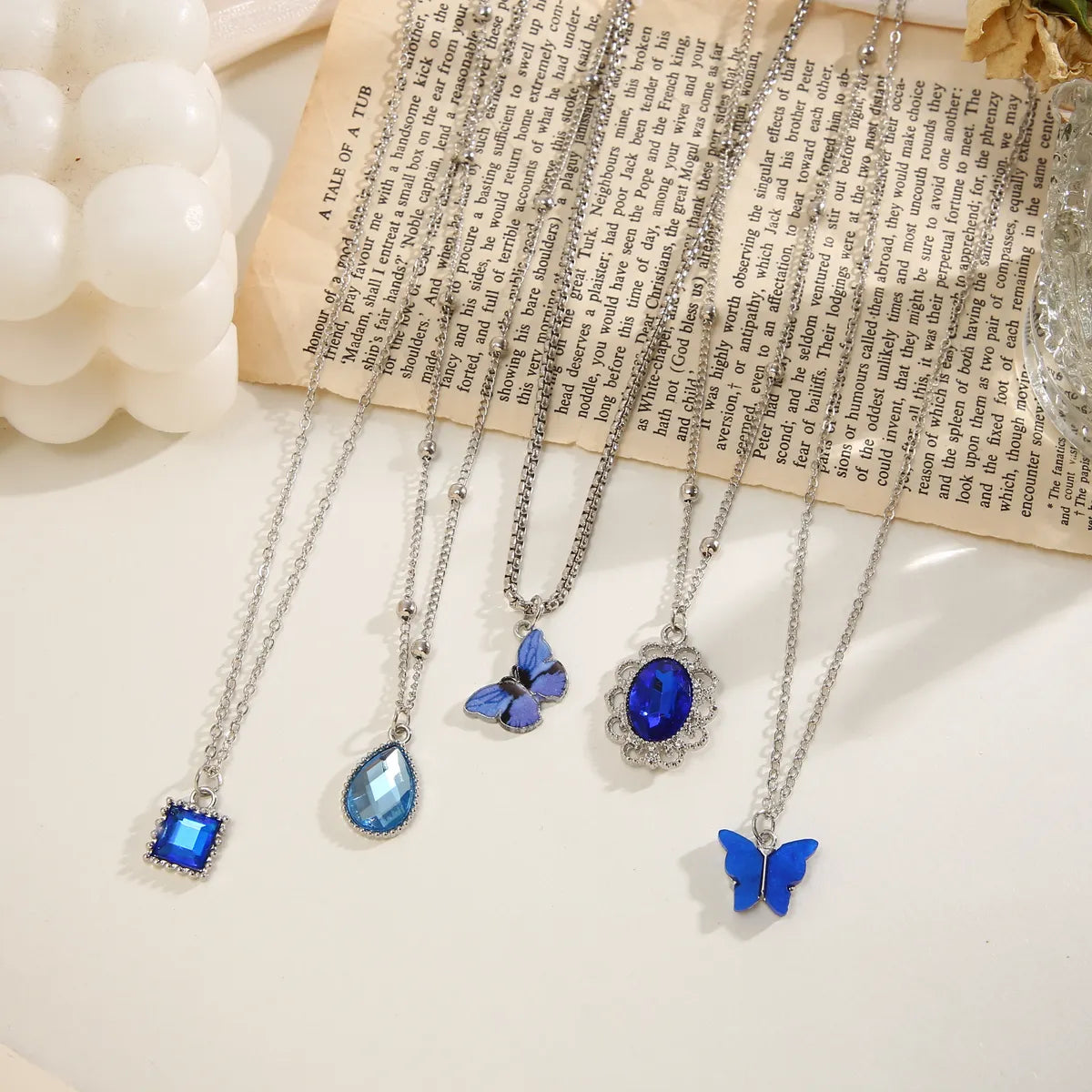 5 Piece Set Casual Water Droplets Heart Shape Butterfly Alloy Plating Inlay Artificial Gemstones Artificial Rhinestones Artificial Pearls Gold Plated Silver Plated Women's Pendant Necklace