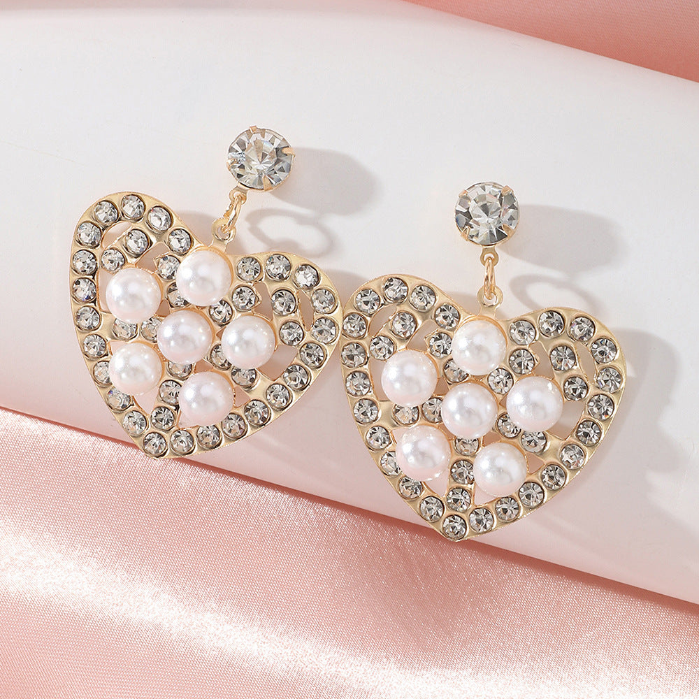 Fashion Hollow Heart Shaped Inlaid Pearl Diamond Metal Drop Earrings