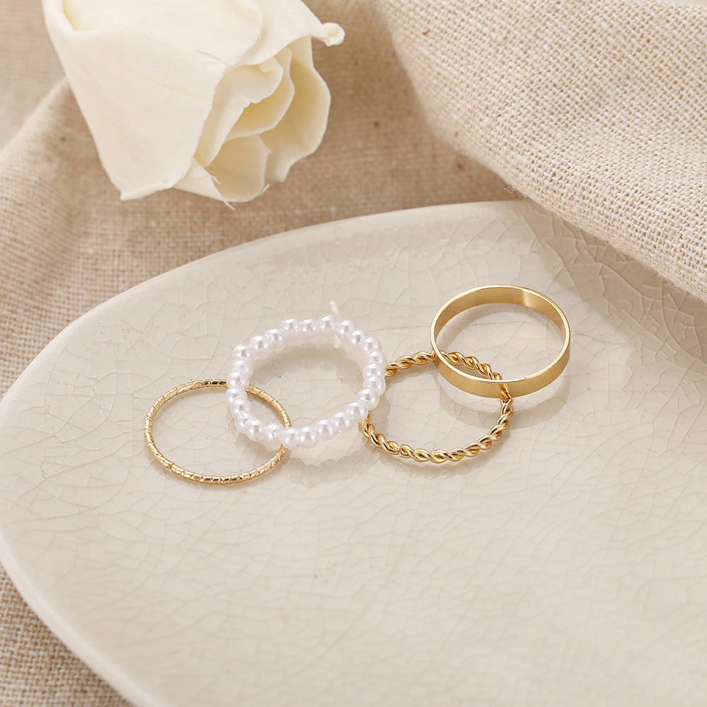 Fashion Simple Pearl Wave Twist Joint Alloy Ring Four-piece Set