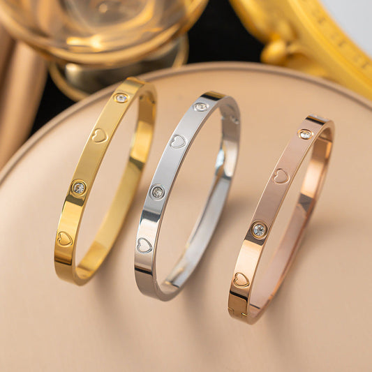 Ellipse Titanium Steel 18K Gold Plated Bangles