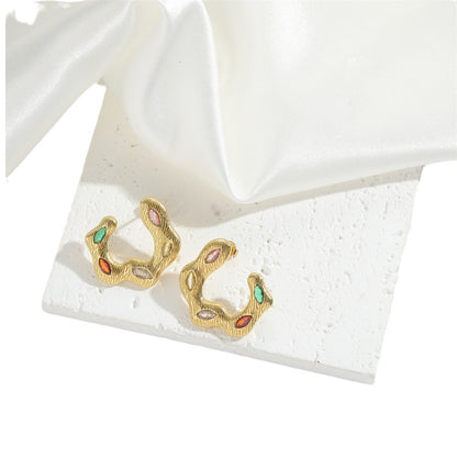 European and American hot-selling Hong Kong style retro twist design sense temperament earrings are niche fashion and versatile high-end earrings and accessories