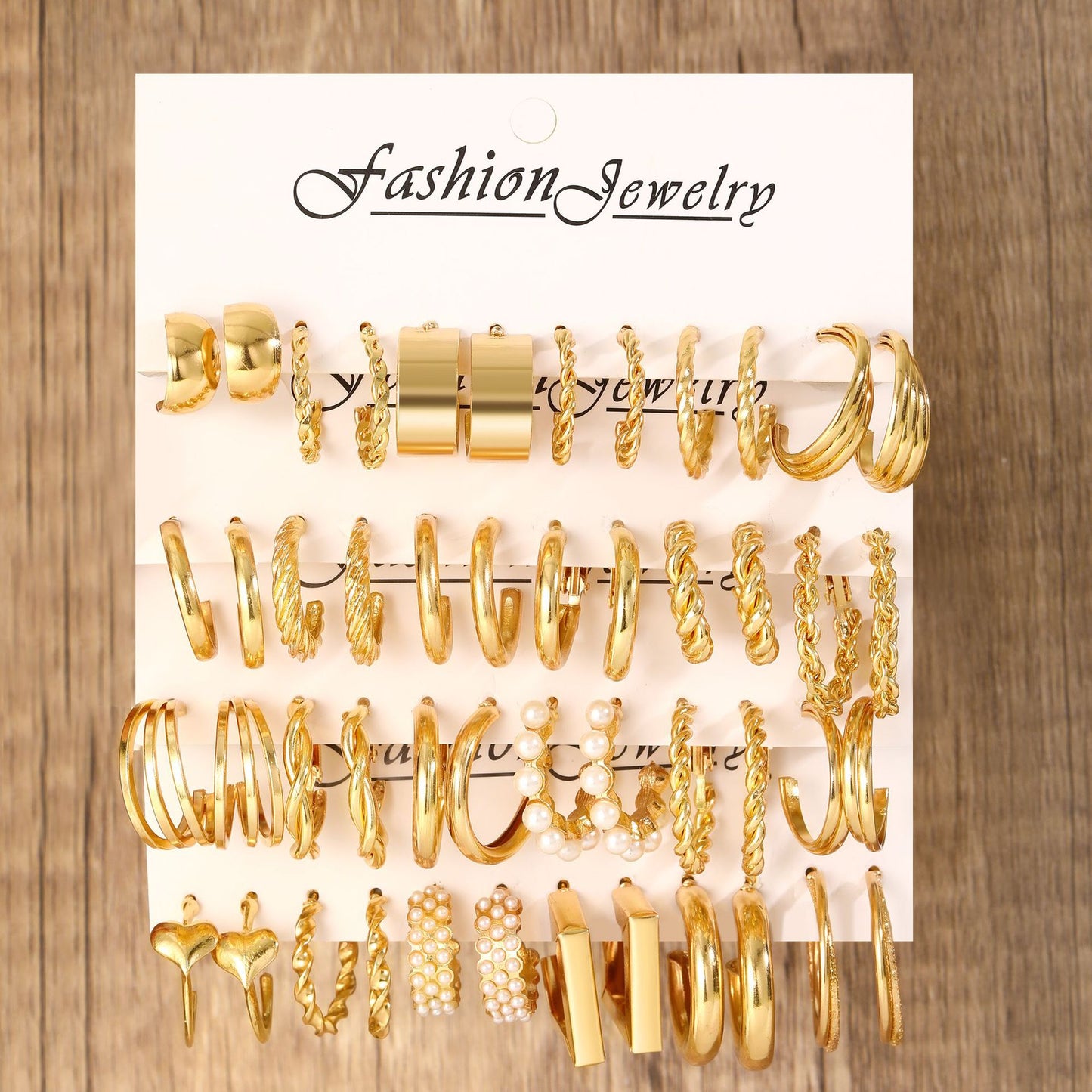 Cross-border hot selling metal twist earrings set 24 pieces simple C-shaped pearl earrings earrings with three-tube pearls