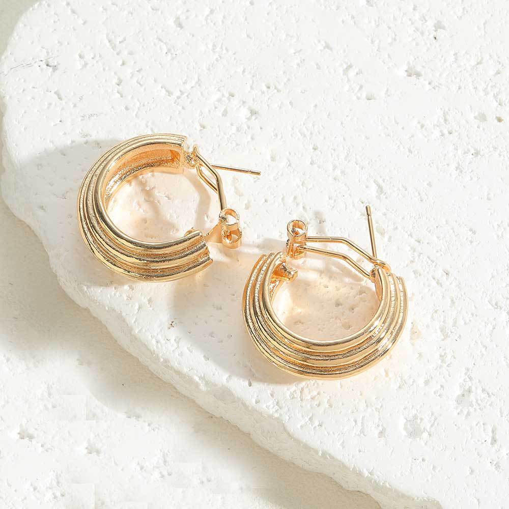 European and American popular copper-plated 14k real gold concave and convex design earrings earrings literary retro Internet celebrity style pearl earrings female