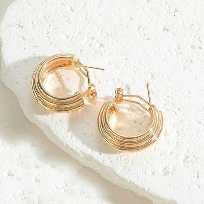 European and American popular copper-plated 14k real gold concave and convex design earrings earrings literary retro Internet celebrity style pearl earrings female