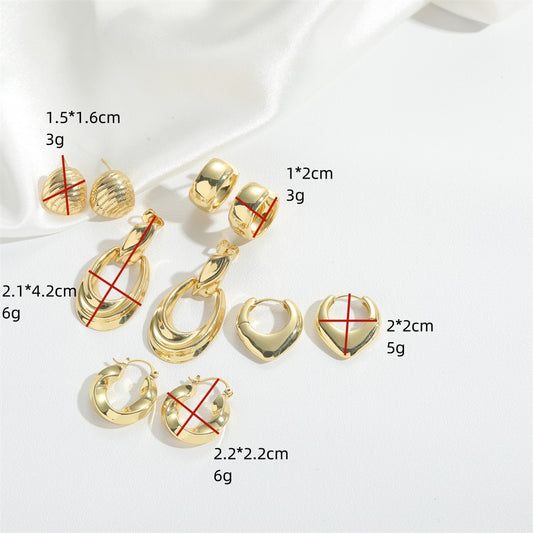 European and American new literary retro retro Hong Kong style U-shaped peach heart design sense earrings small and exquisite, trendy earrings women