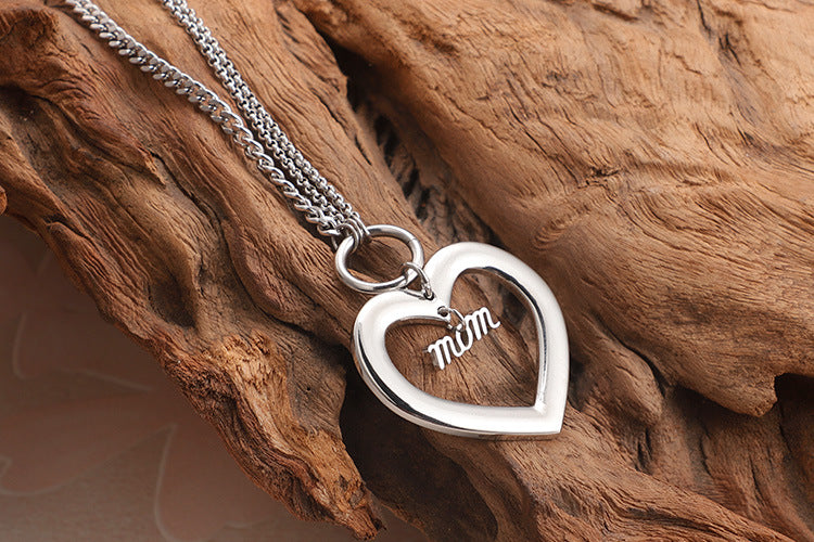 Fashion Titanium Steel Hollow Heart Earrings Necklace Set Wholesale