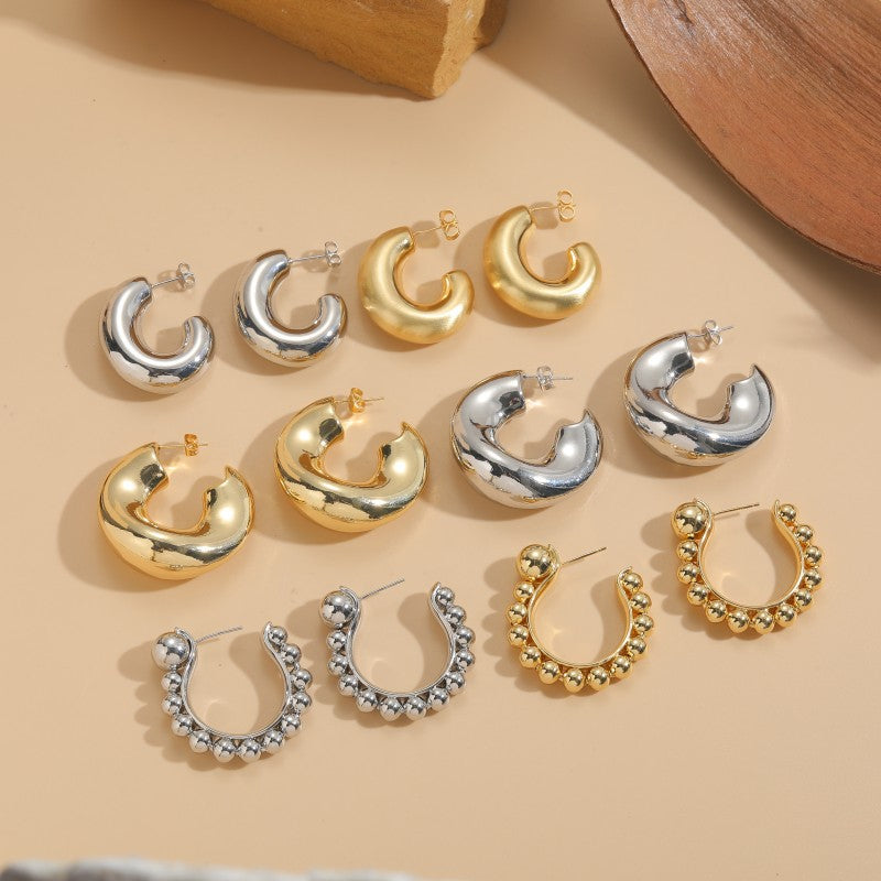 Cross-border hot new C-shaped brass earrings women's independent station exaggerated big earrings cold wind 925 white fungus needle earrings