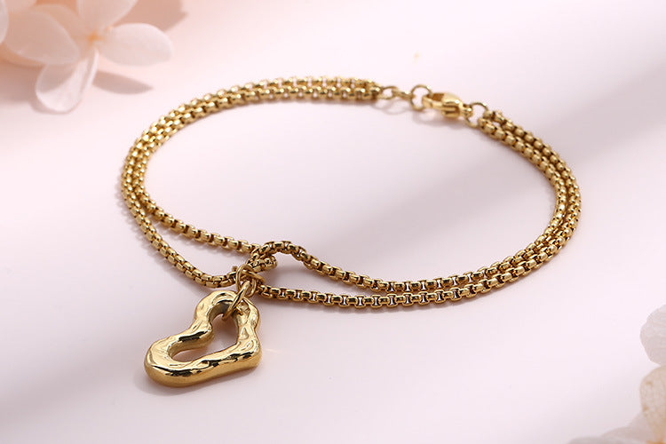 Personality Multi-layer Pearl Chain Heart-shaped Hollow Pendant Stainless Steel Bracelet Wholesale