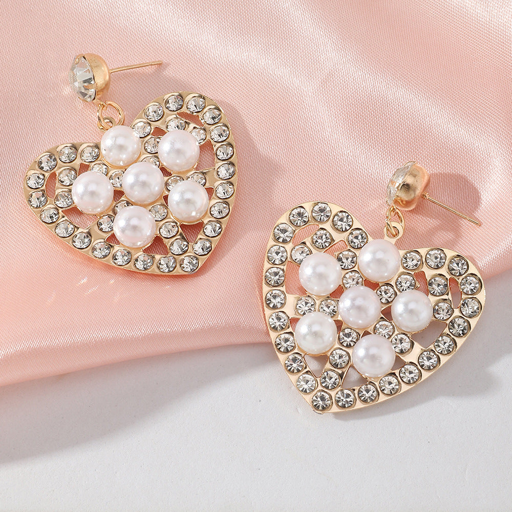 Fashion Hollow Heart Shaped Inlaid Pearl Diamond Metal Drop Earrings