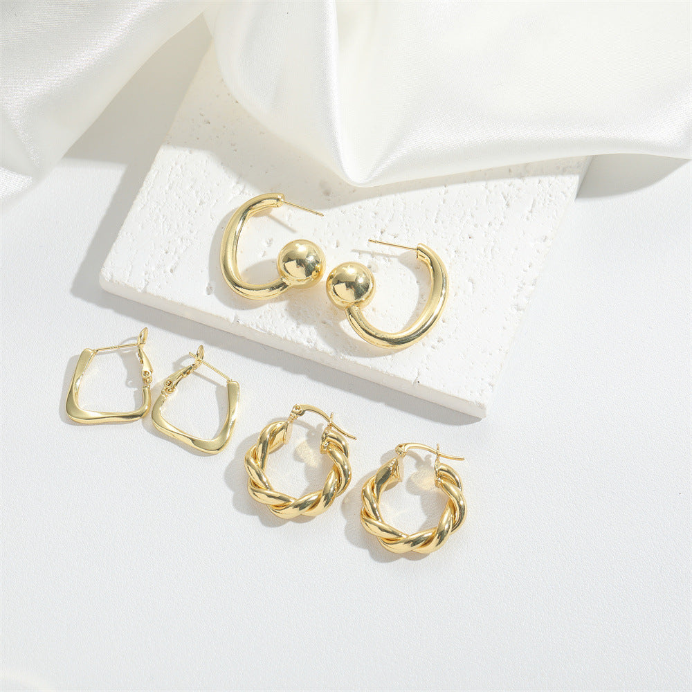 European and American hot-selling Hong Kong style retro twist design sense temperament earrings are niche fashion and versatile high-end earrings and accessories