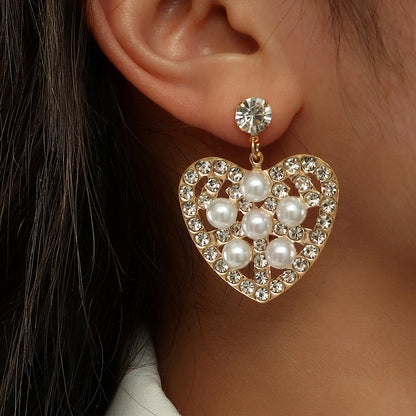 Fashion Hollow Heart Shaped Inlaid Pearl Diamond Metal Drop Earrings