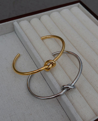 Fashion Solid Color Titanium Steel Plating Knot Bangle