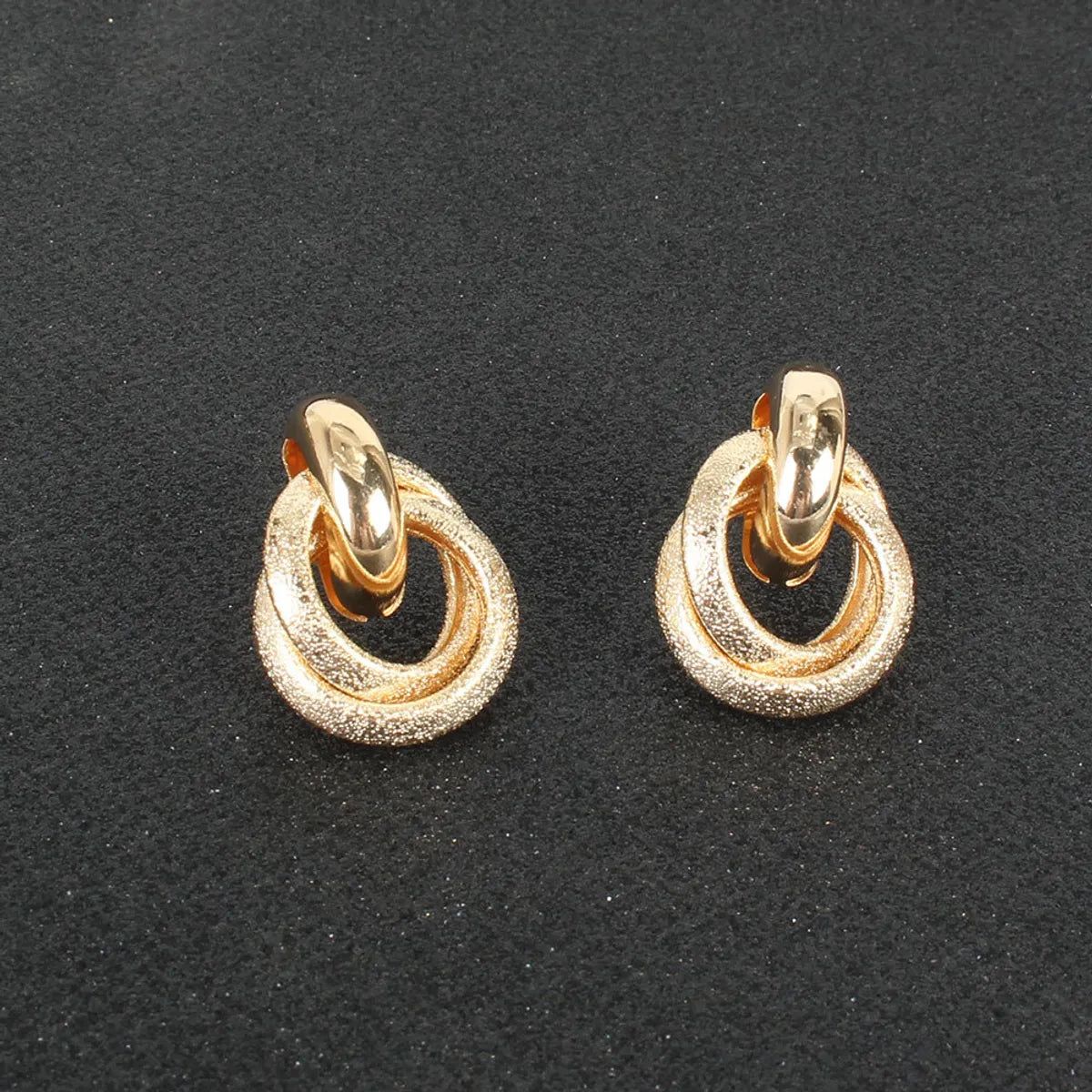 Alloy Geometric  Hollow Fashion All-match Earrings Wholesale