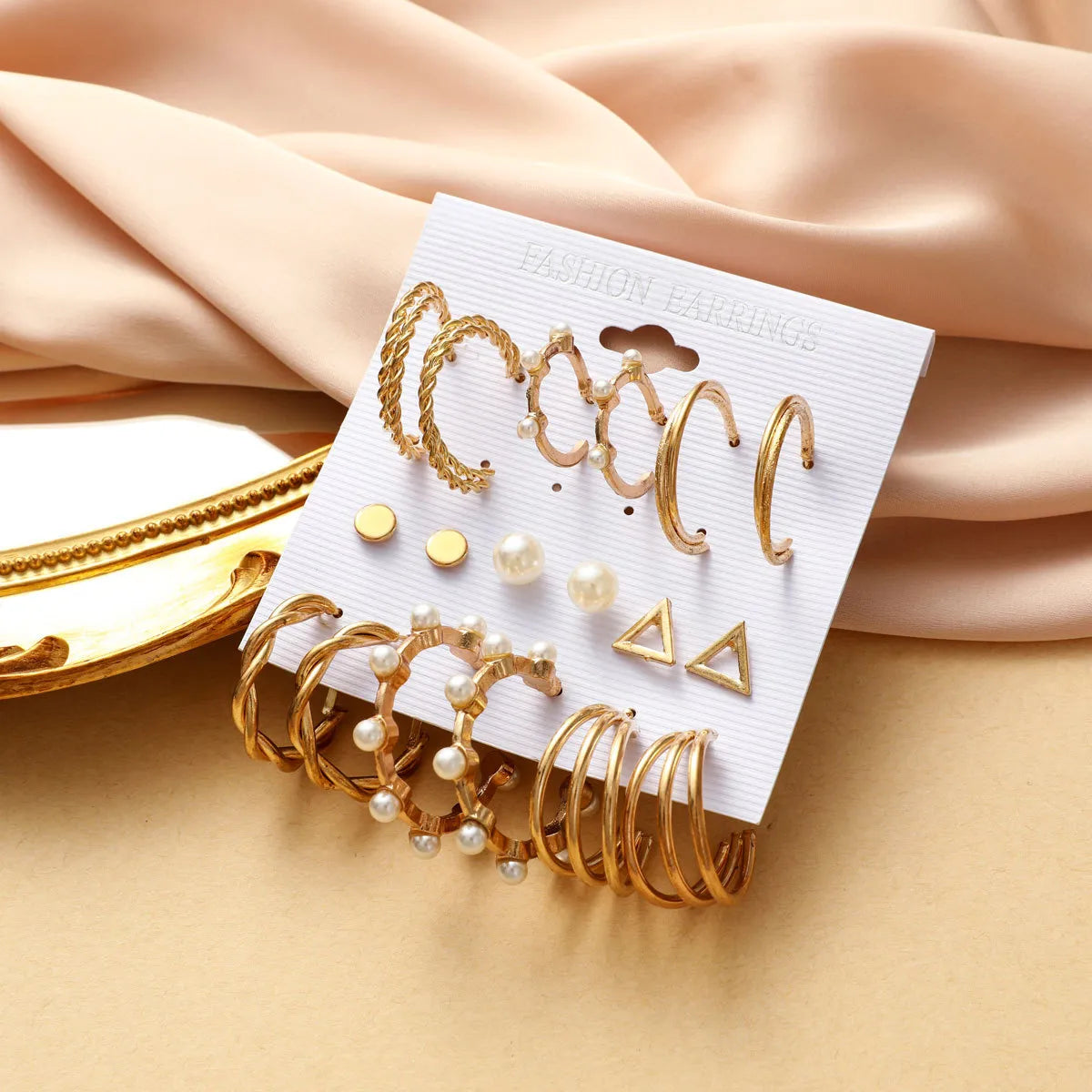 Basic Simple Style Heart Shape Spiral Stripe Leopard Arylic Imitation Pearl Alloy Inlay Rhinestones Women'S Earrings