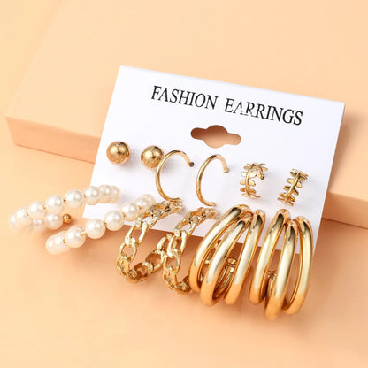 Basic Simple Style Heart Shape Spiral Stripe Leopard Arylic Imitation Pearl Alloy Inlay Rhinestones Women'S Earrings