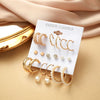 Basic Simple Style Heart Shape Spiral Stripe Leopard Arylic Imitation Pearl Alloy Inlay Rhinestones Women'S Earrings