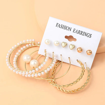 Basic Simple Style Heart Shape Spiral Stripe Leopard Arylic Imitation Pearl Alloy Inlay Rhinestones Women'S Earrings