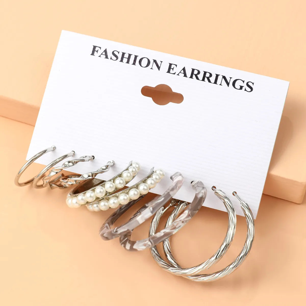 Basic Simple Style Heart Shape Spiral Stripe Leopard Arylic Imitation Pearl Alloy Inlay Rhinestones Women'S Earrings