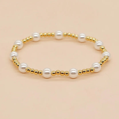 Bohemian Devil's Eye Flower Imitation Pearl Alloy Wholesale Bracelets