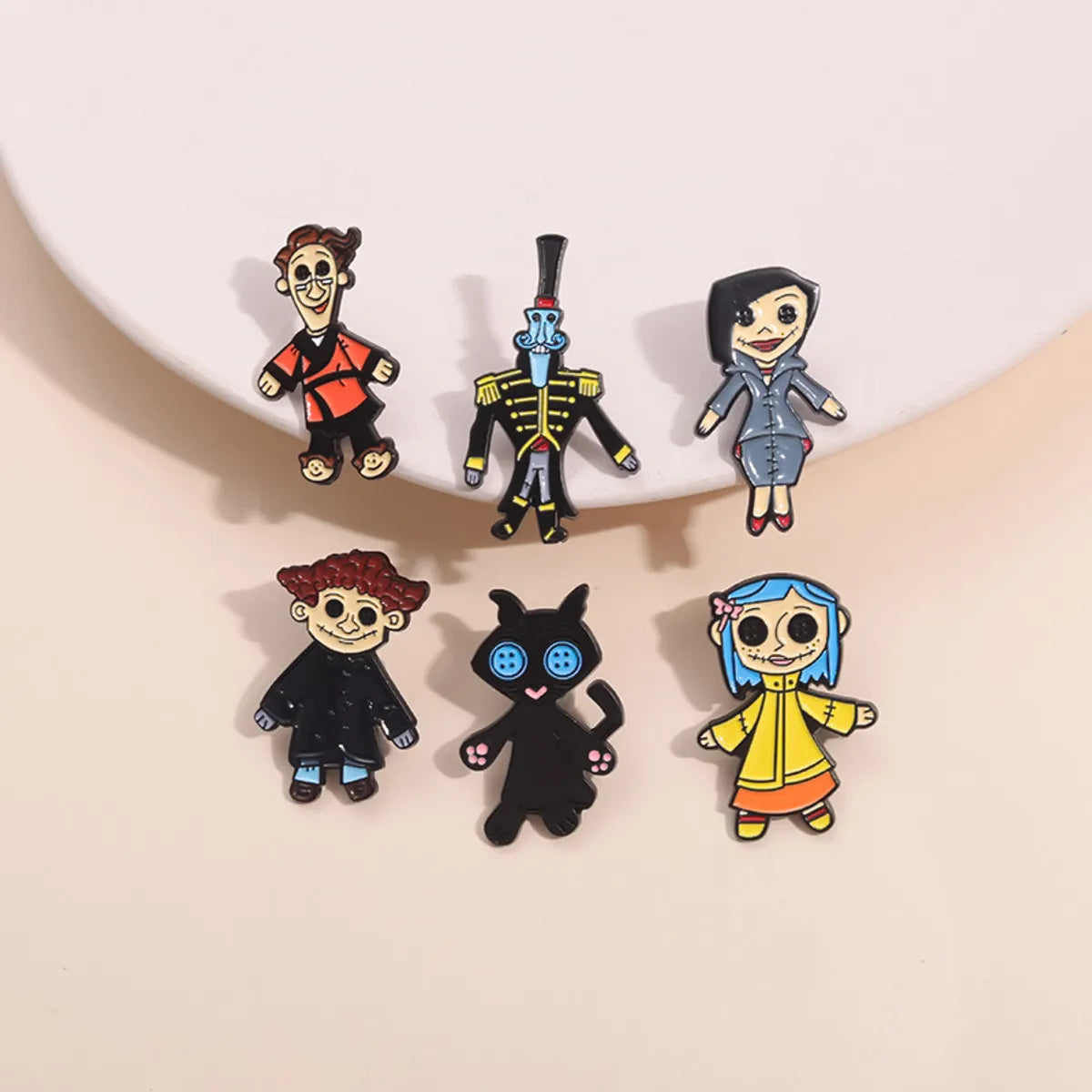 Casual Cartoon Style Simple Style Cartoon Character Alloy Asymmetrical Stoving Varnish Unisex Brooches