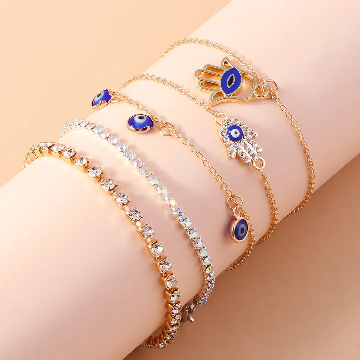 Casual Modern Style Devil'S Eye Palm Zinc Alloy Enamel Hollow Out Inlay Rhinestones Women'S Bracelets