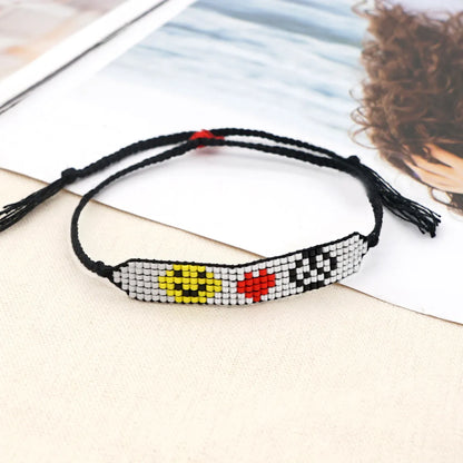 Casual Peach Eye Smile Face Glass Beaded Braid Woven Belt Women'S Bracelets