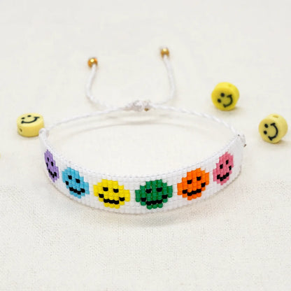 Casual Peach Eye Smile Face Glass Beaded Braid Woven Belt Women'S Bracelets