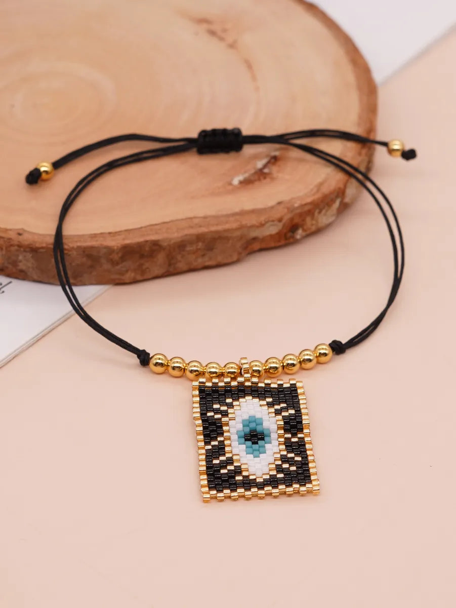 Casual Peach Eye Smile Face Glass Beaded Braid Woven Belt Women'S Bracelets