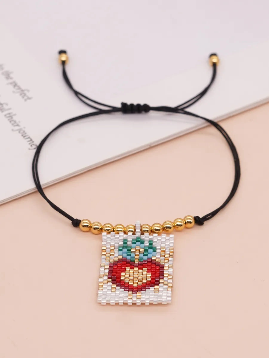 Casual Peach Eye Smile Face Glass Beaded Braid Woven Belt Women'S Bracelets