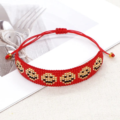 Casual Peach Eye Smile Face Glass Beaded Braid Woven Belt Women'S Bracelets