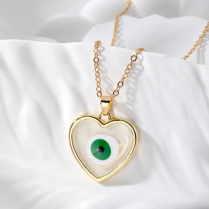 Casual Simple Style Heart Shape Eye Alloy Resin Women'S Pendant Necklace