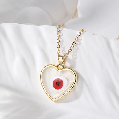 Casual Simple Style Heart Shape Eye Alloy Resin Women'S Pendant Necklace