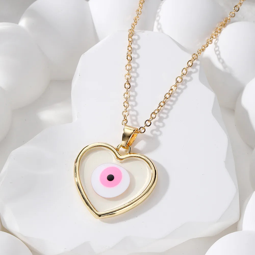 Casual Simple Style Heart Shape Eye Alloy Resin Women'S Pendant Necklace