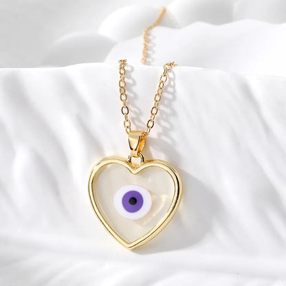 Casual Simple Style Heart Shape Eye Alloy Resin Women'S Pendant Necklace