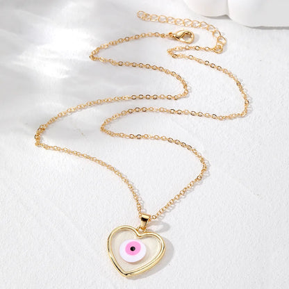 Casual Simple Style Heart Shape Eye Alloy Resin Women'S Pendant Necklace