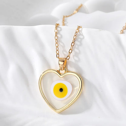 Casual Simple Style Heart Shape Eye Alloy Resin Women'S Pendant Necklace