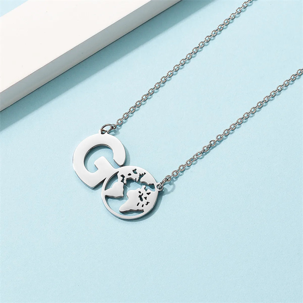 Casual Simple Style Map Letter Stainless Steel Hollow Out Pendant Necklace